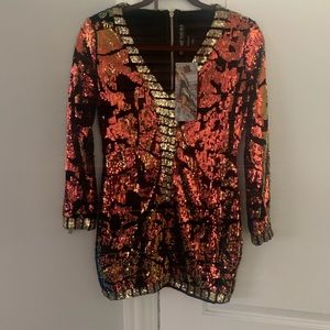 Angel Brinks dress size med. Runs small. Size 2-4